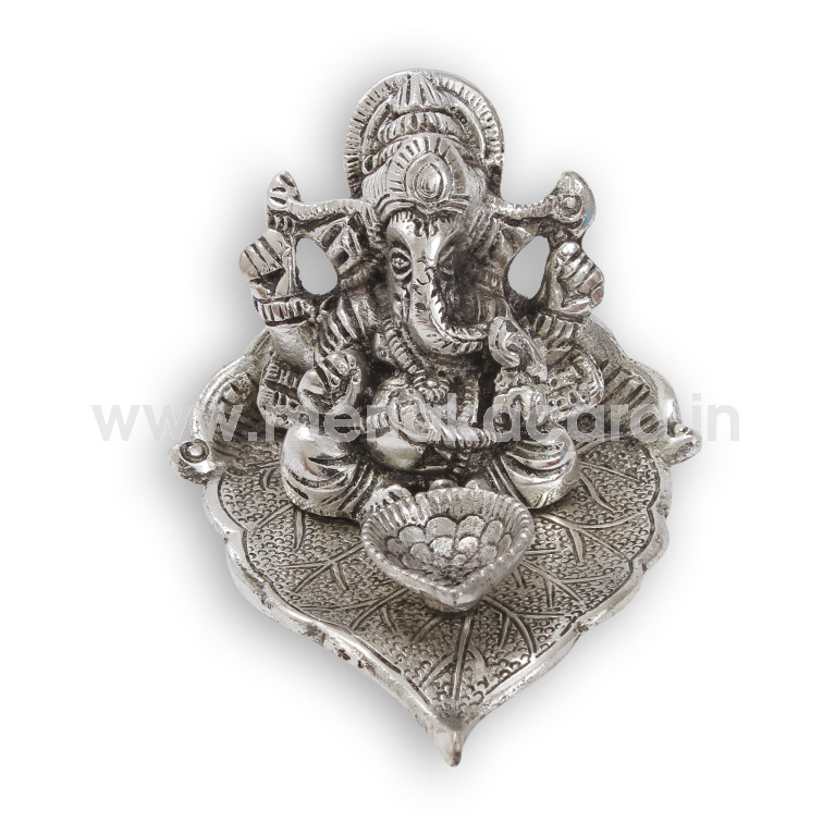 Ganesha on leaf small with deepak